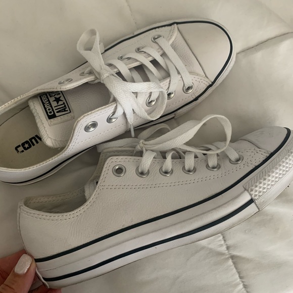 white leather converse with black stripe